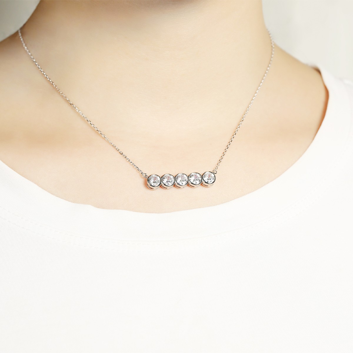 Quinta - Five Stone Moissanite Necklace in Bezel Setting