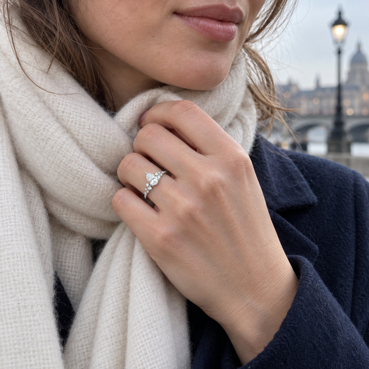 Estelle - Pear Cut Moissanite Ring with Scattered Side Stones