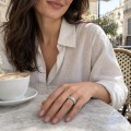 Duetta - Round Moissanite Eternity Band with X Motifs