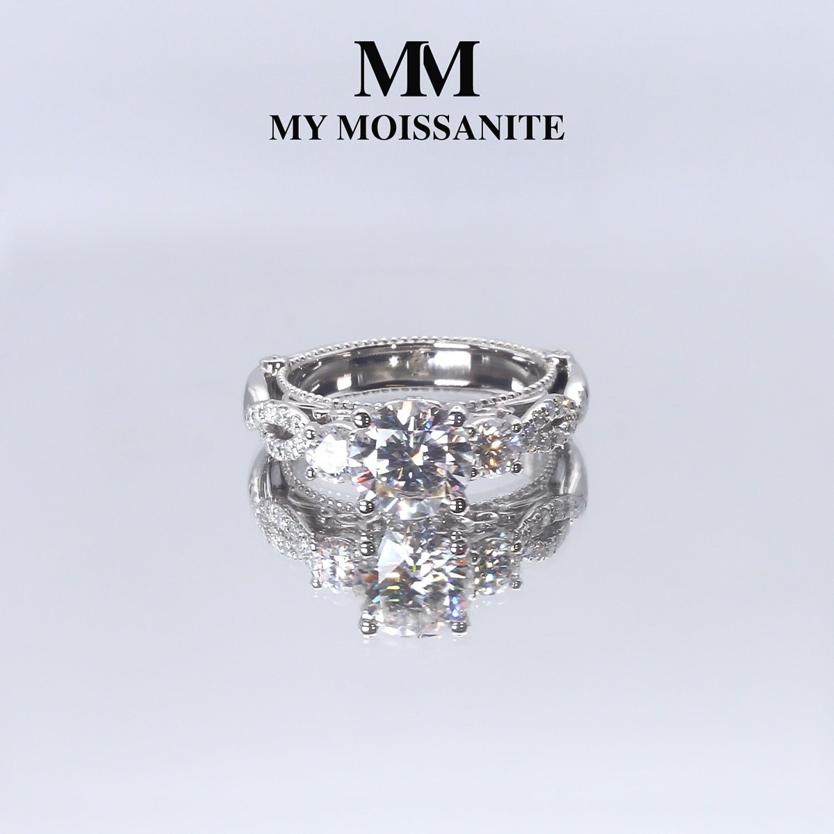 Circe - Vintage Inspired Moissanite Engagement Ring with Side Stones and Filigree Detailing