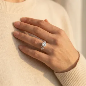 Side stone engagement rings