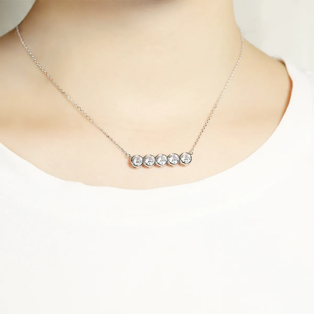 Quinta - Five Stone Moissanite Necklace in Bezel Setting