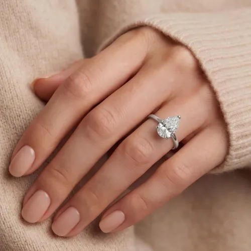 Larissa - Pear Solitaire Moissanite Ring - lifestyle